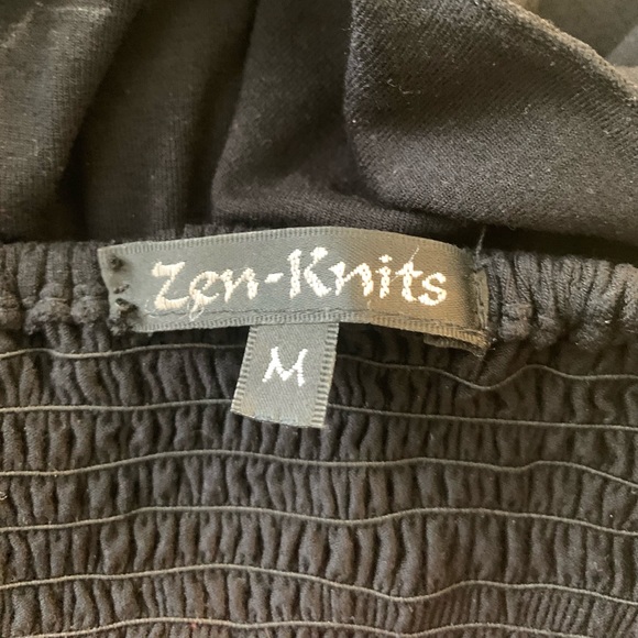 Black strapless smocked flowy top. Size medium. - Picture 11 of 13